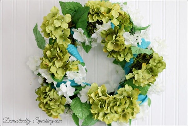 Spring Wreath: Blues, Greens and Burlap @ Domestically-Speaking.com spring, wreath, blue, burlap, flowers, moss, green, hydrangeas