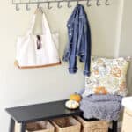 Fall decor in a mini mudroom - perfect to organize your family.