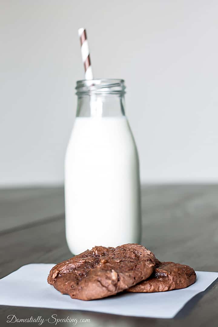 Devil's Food Cake Mix Cookies with Junior Mints are an easy cake mix chocolate cookie packed with a delicious mint! chocolate cookie and milk on table