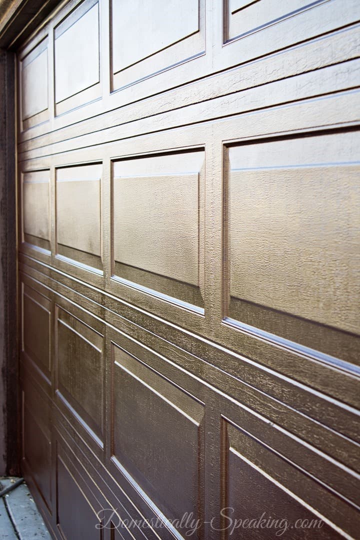Closeup on Garage Door Makeover with Stain looks like faux wood Closeup on Garage Door Makeover with Stain looks like faux wood