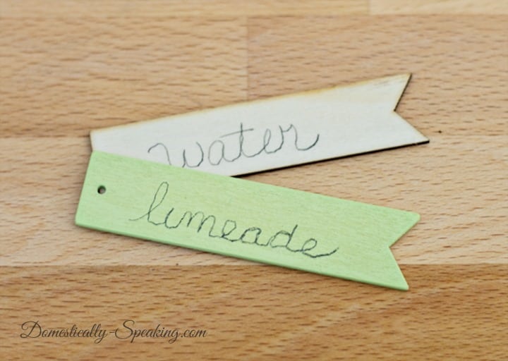 Hand written labels on wooden tags.