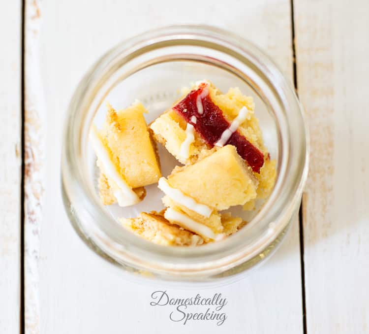 Layering strawberry cheesecake for the trifle