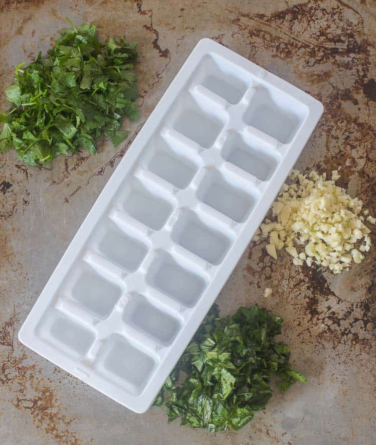 Chopped fresh herbs for your ice cube tray Chopped fresh herbs for your ice cube tray