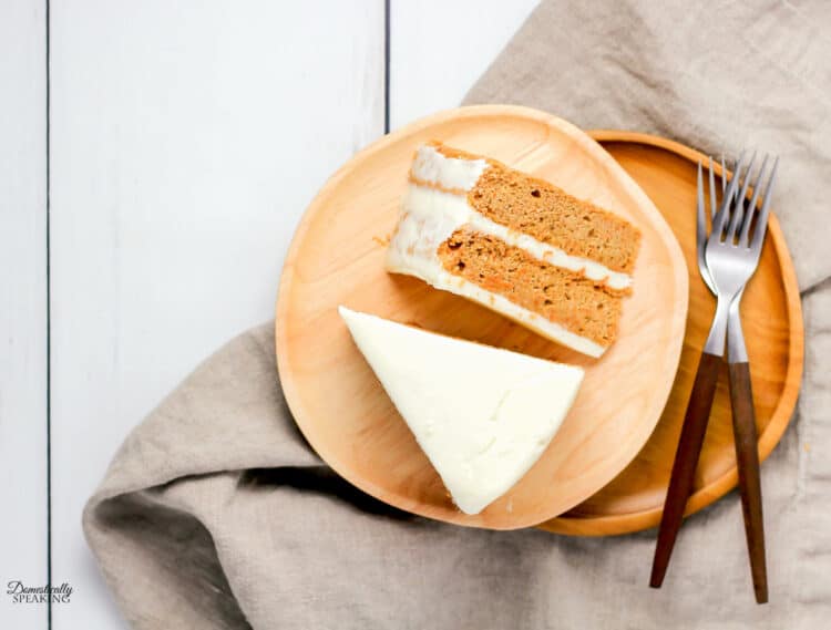 Easy Carrot Spice Cake make with only a few ingredients perfect with this delicious cream cheese frosting. 2 slices of carrot spice cake that is moist and made with Greek yogurt