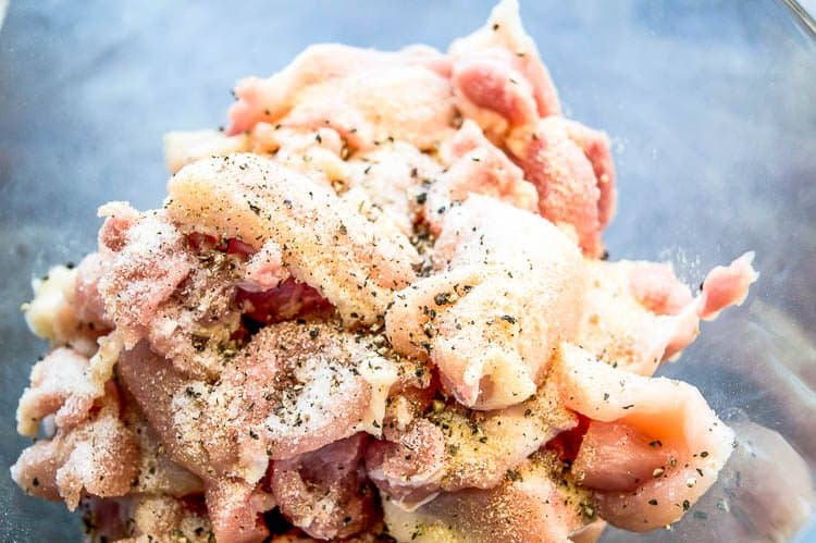 seasoning the chicken to cook