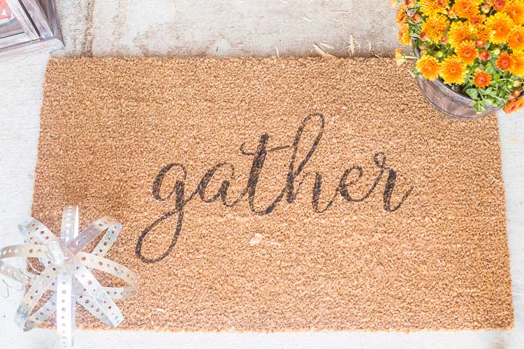 Rustic Industrial Autumn Porch with a Large Wood and Metal Lantern, Leaf Wreath, DIY Metal Pumpkins, Gather Doormat and lots of Fall Mums