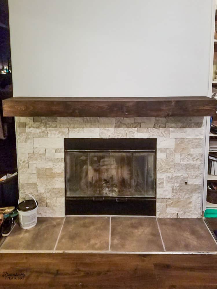 DIY rustic fireplace mantel: the cure for a boring fireplace