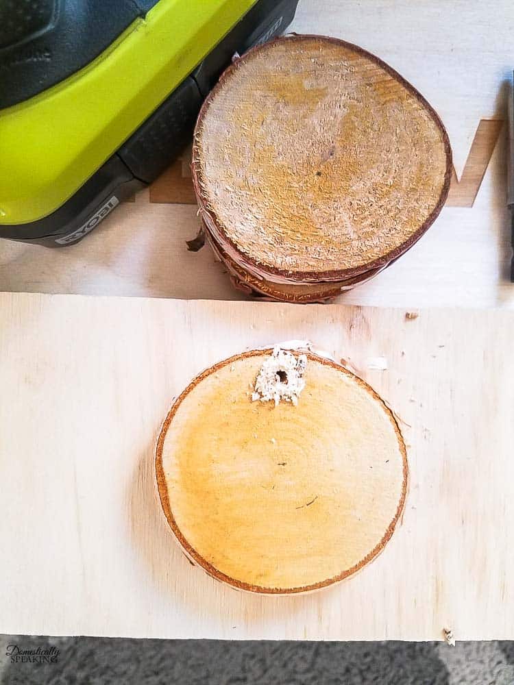 Rustic Twine and Wood Slice Christmas Ornament prepping wood slice