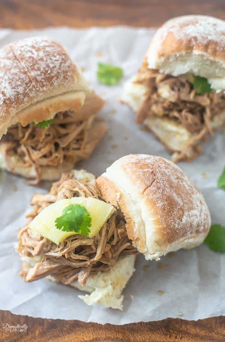 Crockpot Hawaiian Pulled Pork Sliders are moist and juicy sandwiches that are a great weeknight dinner idea. Delicious pineapple, garlic, soy sauce and more!