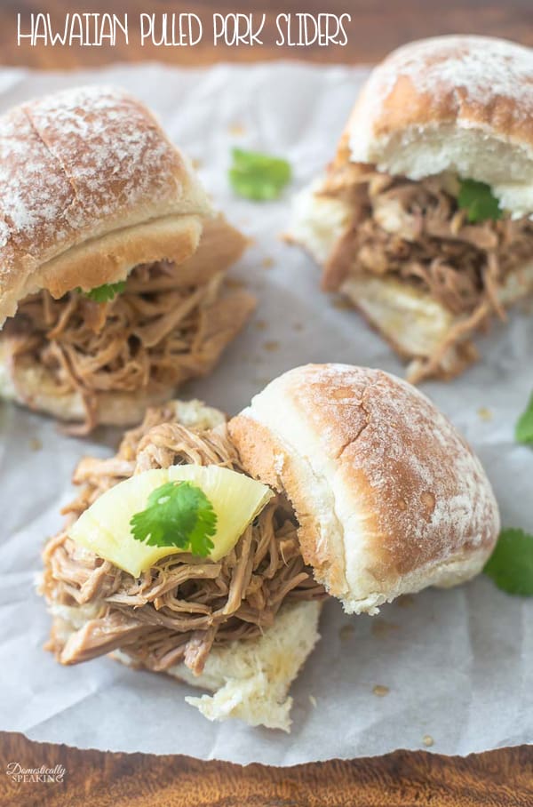 Crockpot Hawaiian Pulled Pork Sliders are moist and juicy sandwiches that are a great weeknight dinner idea. Delicious pineapple, garlic, soy sauce and more!