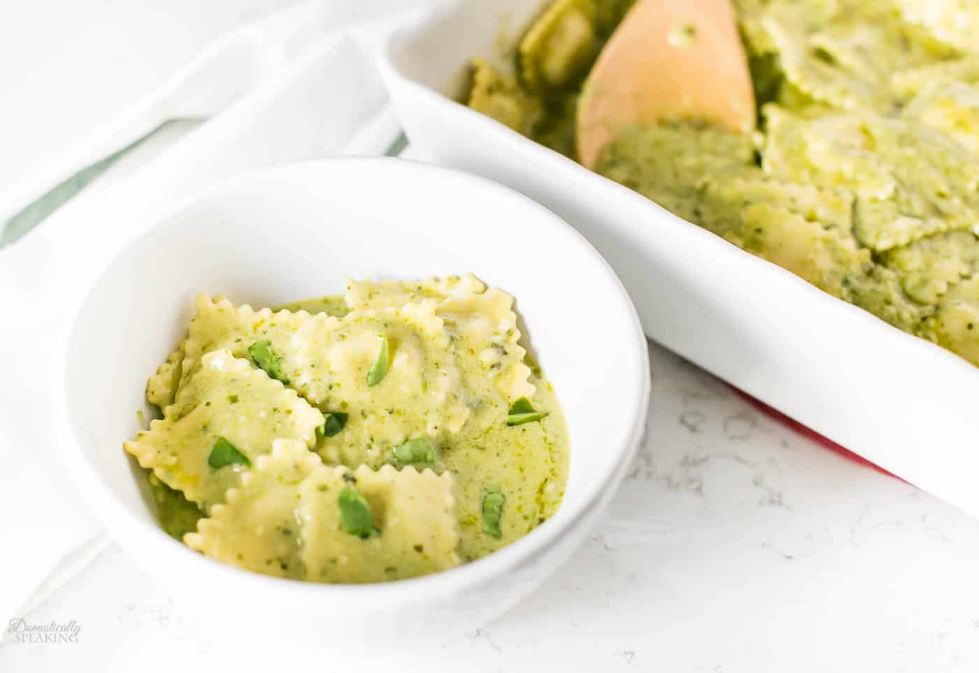 Baked Ravioli with Pesto Cream Sauce is a great one pan dinner recipe! Baked Ravioli with Pesto Cream Sauce is a great one pan dinner recipe!