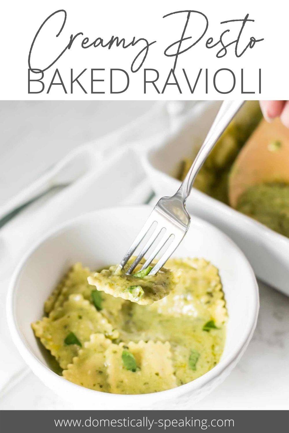 Baked Ravioli with Pesto Creamy Sauce Domestically Speaking