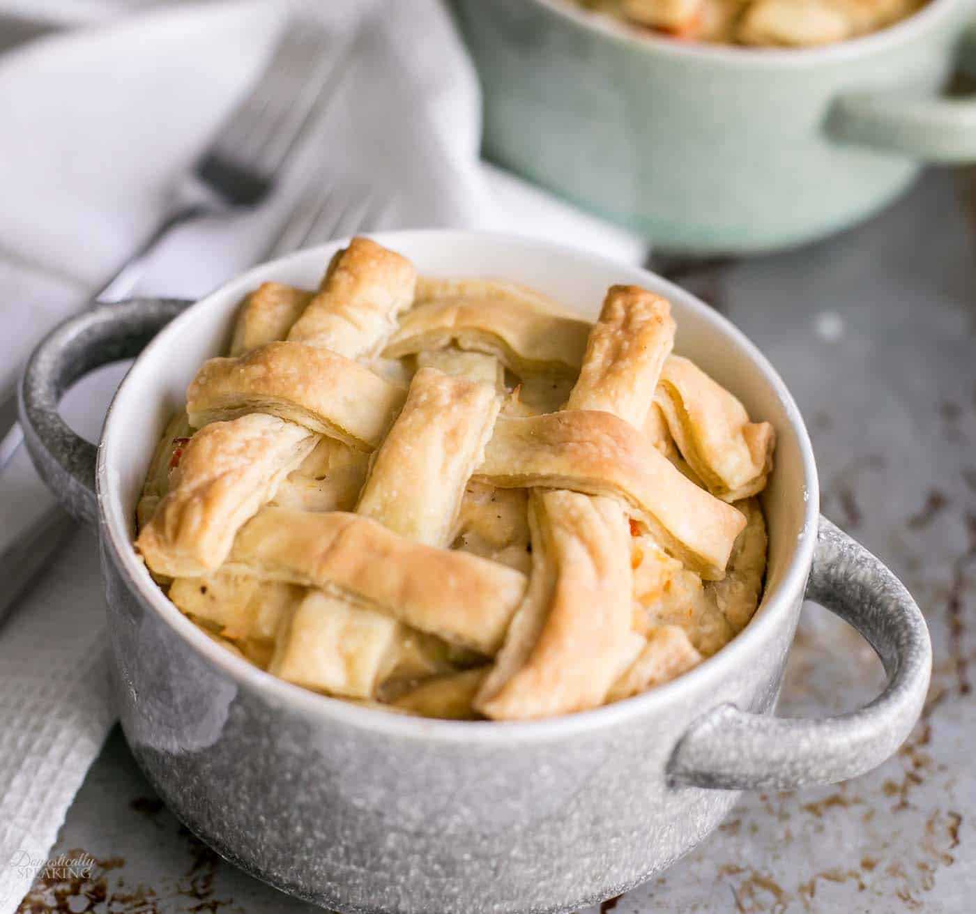 Rustic Homemade Chicken Pot Pie with Puff Pastry Crust - the ultimate comfort food with potatoes, carrots, chicken and a delicious creamy sauce. Rustic Homemade Chicken Pot Pie with Puff Pastry Crust