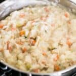 adding chicken to pot pie mixture