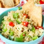 Quinoa Salad with Peppers in a blue bowl.