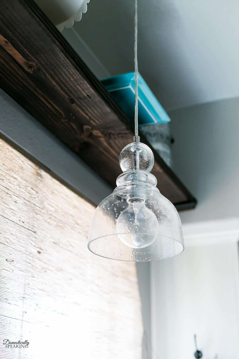 Seeded Glass Pendant Light Fixtures seeded glass pendant hanging over the kitchen sink