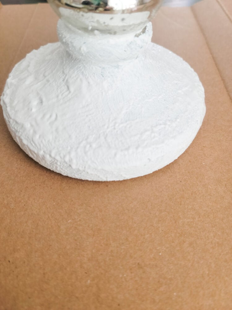 plaster on candle holder