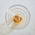 graham cracker chunks in bottom of glass