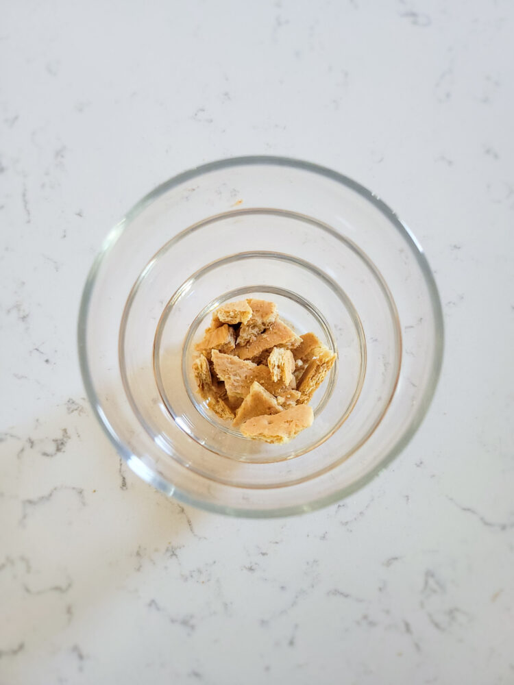 graham cracker chunks in bottom of glass