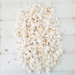 popped popcorn on parchment paper