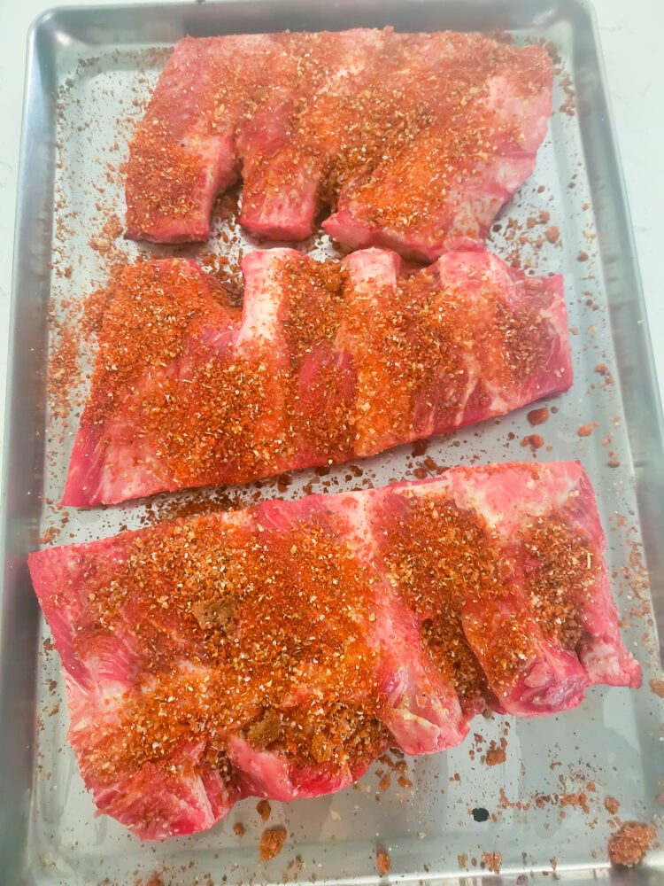 putting rub on beef ribs