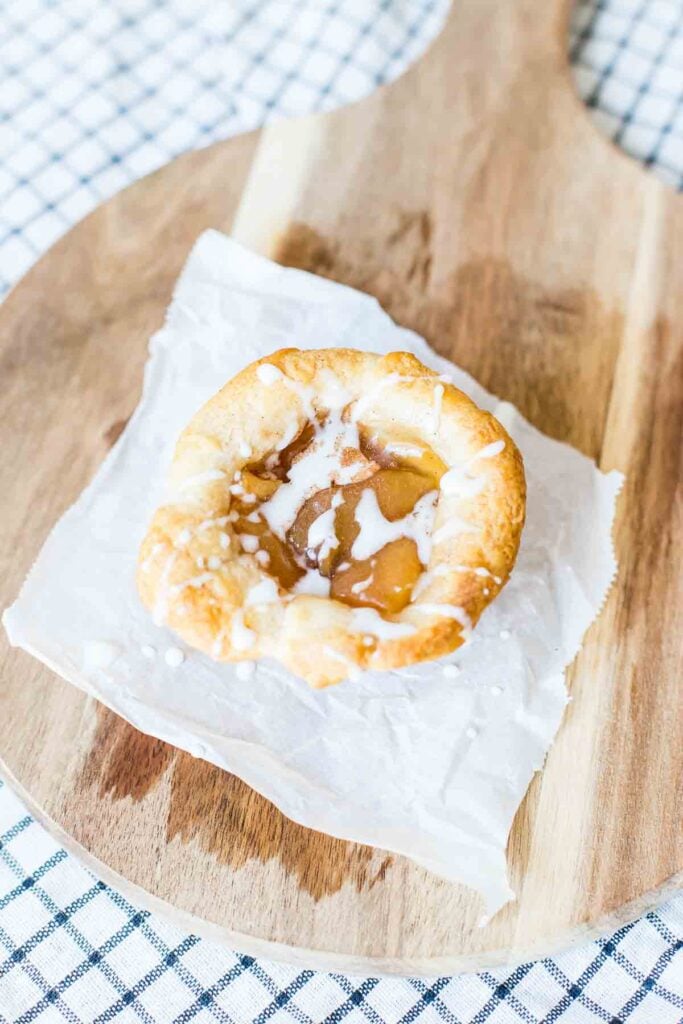 apple crescent muffins with a icing drizzle on top