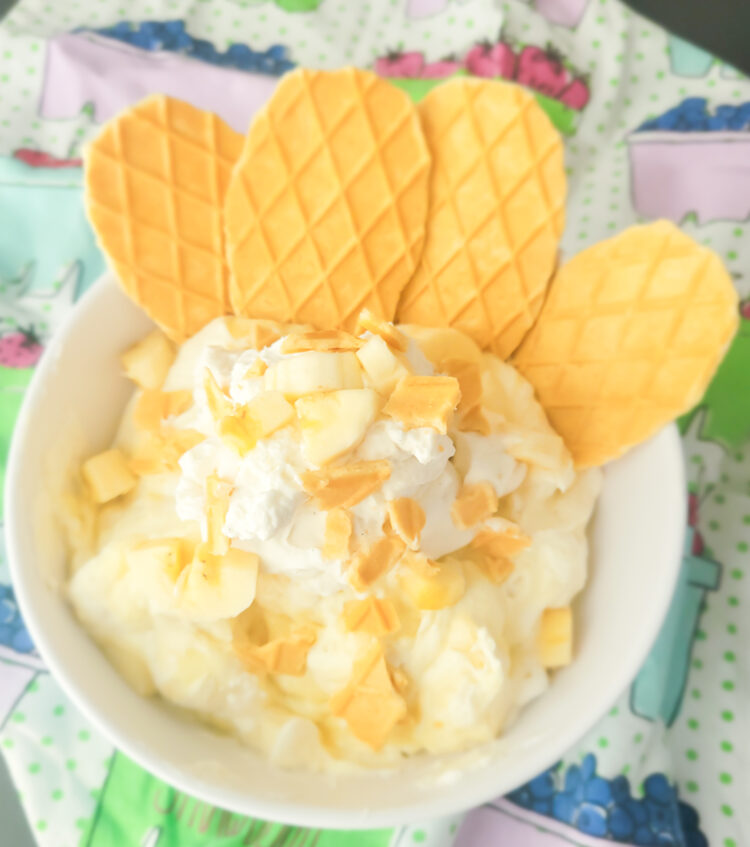 Banana Pie Dip with vanilla pudding, whipped cream, and bananas with waffle cookies to dip!