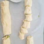 slicing the crescent logs to form the pinwheels