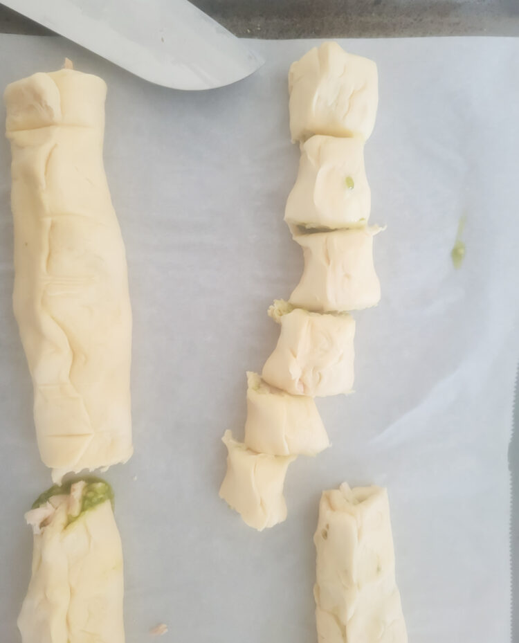 slicing the crescent logs to form the pinwheels
