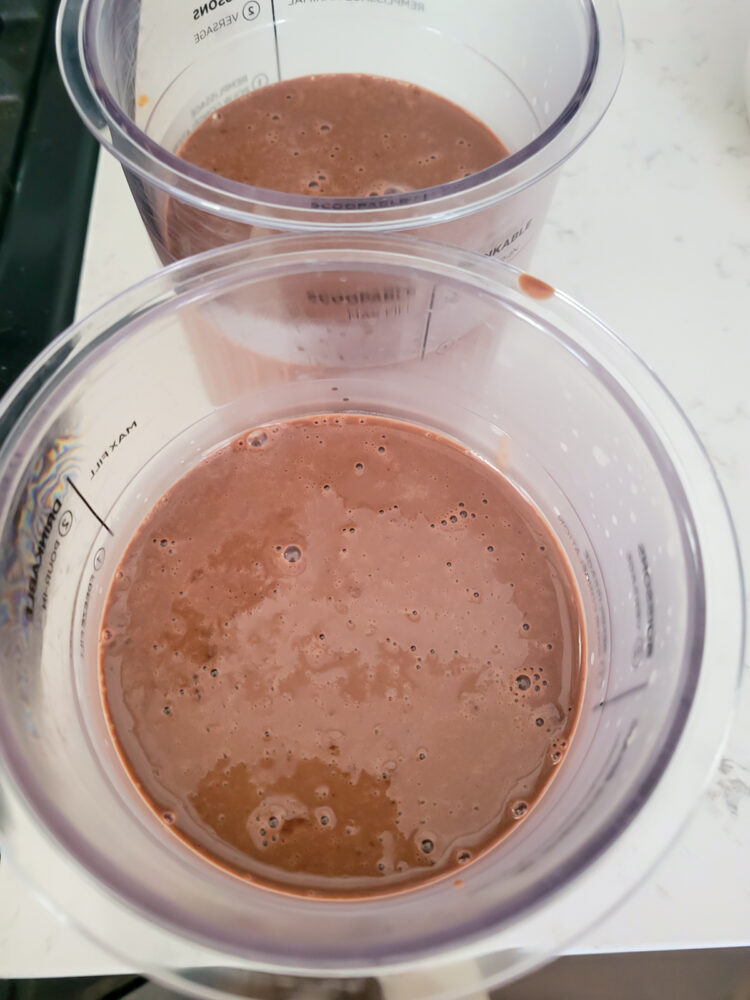 pour chocolate ice cream mixture into ninja creami containers