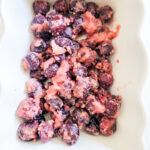 cherry filling mixture poured into baking dish