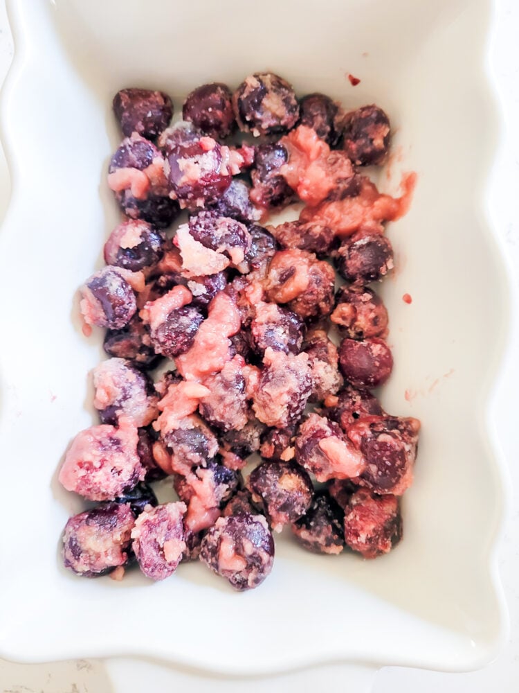 cherry filling mixture poured into baking dish