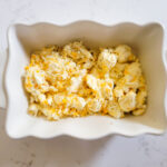 Cheese mixture spread into pan