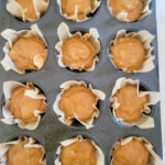 muffin batter in liners ready to bake