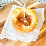 adding drizzle to apple crescent muffin