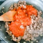 Meat mixture for loaf lasagna. Ground beef, onions, garlic, and marinara sauce.