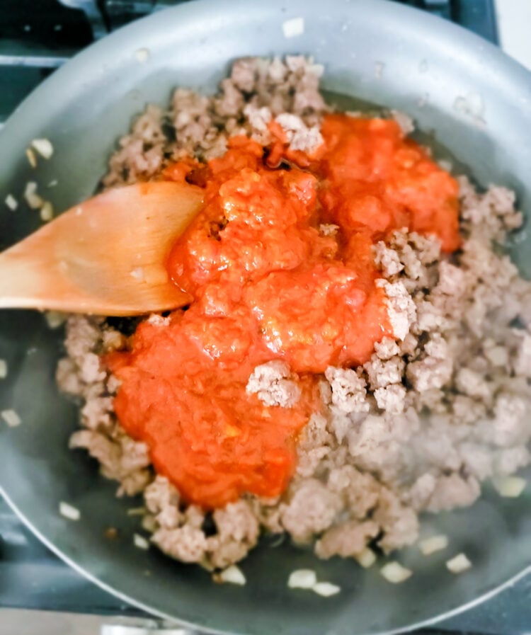 Meat mixture for loaf lasagna. Ground beef, onions, garlic, and marinara sauce.