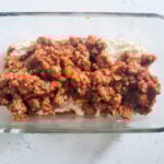 add meat mixture on top of cheese mixture