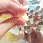 grate frozen butter into flour mixture